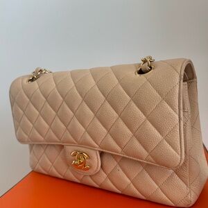 Chanel classic medium caviar flap bag